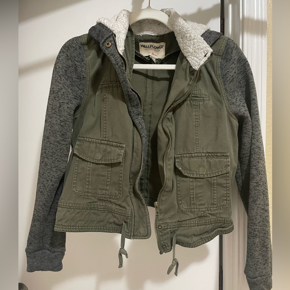 Army green crop jacket with jersey knit sleeves and Sherpa hood